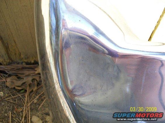 Chrome bumper detail with reflection