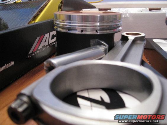 Engine piston and connecting rod with "MAC Advanced Clutch Technology" box