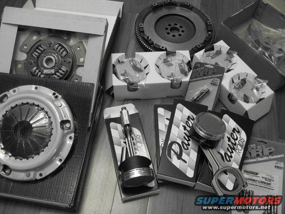 Engine parts: pistons, connecting rods, clutch, and flywheel. Text visible: Pauter Rods, ARP
