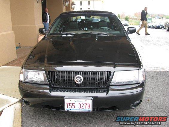 Front view of a black 2003 Mercury Marauder parked outside a building