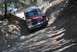 1996 Ford Bronco - Ford Bronco tackling a challenging off-road trail.