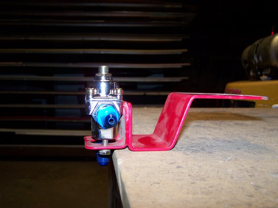 049.jpg this will bolt to the underside of the cowl beside the master cylinder. I can run a short hose to my gauge that will be mounted on the cowl in front of the driver