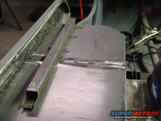 Metal jig with clamps and guides for holding parts during welding