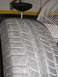 1994 Ford Probe - Close-up of a tire tread pattern. The image includes a watermark for Supermotors.net.