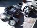 1992 Ford C-350 (Centurion Conversions) - Dodge Turbo parts, including a turbocharger and air cleaner, laid out on a surface.