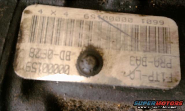 Part label with barcode and text 'BD-QE28' and 'F1TP-LA PRA-BA3'