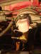 1992 Ford Bronco - Close-up view of the brake booster and master cylinder assembly in a 1992 Ford Bronco.