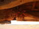 1992 Ford Bronco - Close-up of the vehicle's drivetrain components, including the transmission and driveshaft.