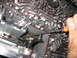 1995 Ford C-350 (Centurion Conversions) - Automatic transmission valve body detail, showing fluid channels and a manual adjustment.