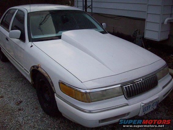 1992 Mercury Grand Marquis with a large aftermarket hood scoop, front view