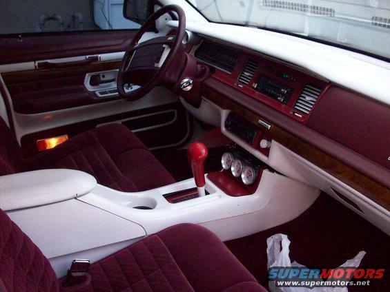 1992 Mercury Grand Marquis interior with maroon velour seats and wood trim