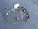 1985 Ford Crown Victoria LTD - A disassembled automotive wiring harness and voltage regulator are shown on the ground.
