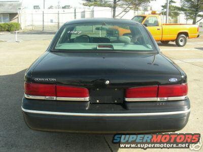 Black 1995 Ford Crown Victoria rear view, chrome trim, visible "CROWN VICTORIA" text on trunk lid