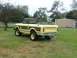 1975 International Scout II - This 1975 International Scout II convertible SUV displays its distinctive wood paneling and rear design.