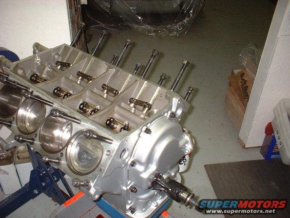 Engine block on stand, showing cylinders and internal components