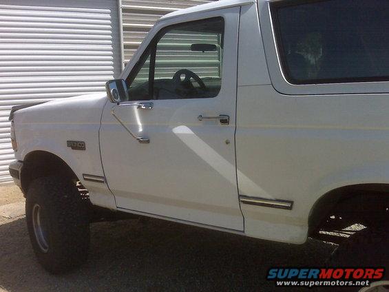 img00203.jpg Notice the driver side door. This was a red door, but used a technique a learned about on the web to use Rust-oleum of all things. Not to bad if us ask me.