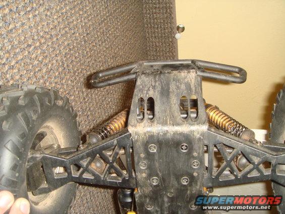 RC car chassis with suspension and tire visible
