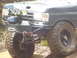 1989 Ford Bronco - This modified truck features a winch and extra lights, suggesting off-road use.