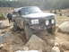 1989 Ford Bronco - A modified 1989 Ford Bronco tackles a challenging off-road course.