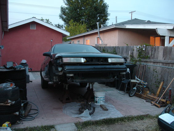1995 Ford Taurus front on jack stands, bumper removed