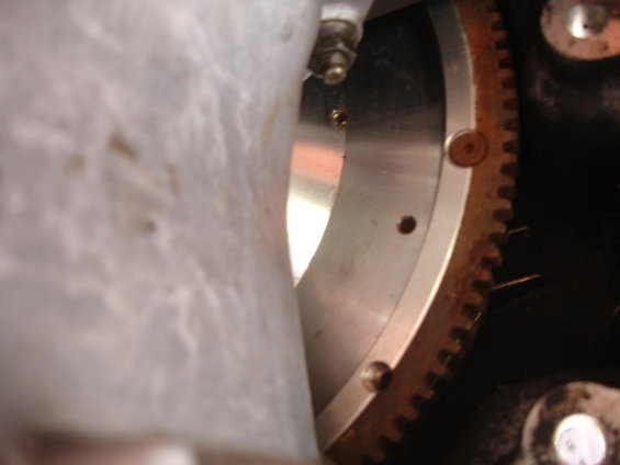 Close-up of a flywheel with a rusty starter ring gear attached