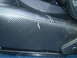 1979 Ford Bronco - The seat upholstery has a carbon fiber texture, but a small rip is visible on the side bolster.