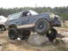 1979 Ford Bronco - Modified Ford Bronco navigating challenging terrain off-road.