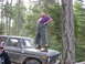 1979 Ford Bronco - A man poses on the hood of a 1979 Ford Bronco during an outdoor gathering.