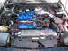 1995 Ford Probe - The engine bay features a prominent blue intake manifold with "3.0 V6" clearly visible.