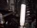 1978 Ford Bronco - Close-up of the front suspension system on a 1978 Ford Bronco, showing the shock and spring.