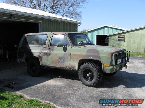 Camouflage 1985 Chevrolet Blazer with bull bar and new tires