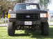 1987 Ford Bronco - This 1987 Ford Bronco features a lifted suspension and aggressive off-road tires, ready for any terrain.