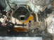 1982 Ford Bronco - Close-up view of a vehicle's engine bay with the transmission removed, revealing the torque converter and engine block.