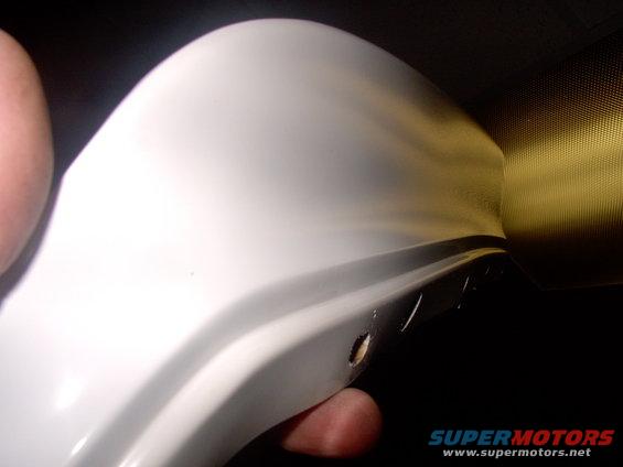 Change of plans. Steamngn, from Lincolnsonline, came through for me in a big way with this 90' filler panel for under the headlight. He also sent me the other side and a pile of other goodies, all in great shape.