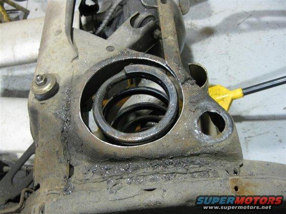 Enlarging the holes to 6-1/4" with one of their cordless grinders and a plug stone.