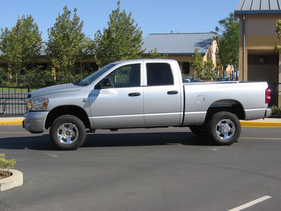 Silver 2007 Dodge 2500 pickup truck, side view