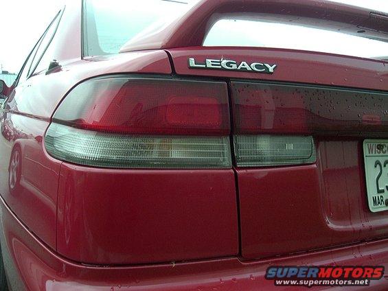 1997 Subaru Legacy sedan rear with 'LEGACY' badge and Wisconsin license plate