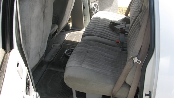 Interior view of truck rear seats and floor mats