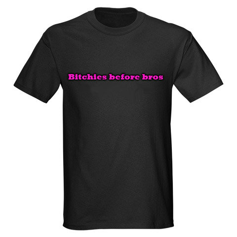 Black t-shirt with pink text that says "Bitchies before bros."