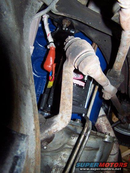 100_2543.jpg you can rotate the body of this Power Master starter to clear headers or steering components, which came in handy to clear this pitman arm; I had to install that little 12 guage jumper wire between the two terminals.