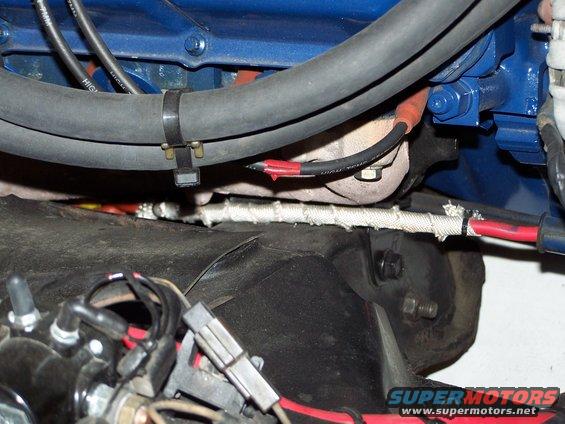 100_2546.jpg I wrapped the starter electical lead with hi-temp insulation, so it doesn't get "baked" by the exhaust manifold.