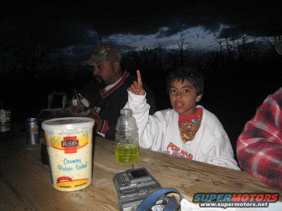 img_0330.jpg My youngest son pointing out that its cold, windy and gettin ready to rain. Also notice the dust and dirt all over his face