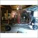 1994 Ford F-250 - This 1994 Ford F-250 is undergoing restoration in a garage, with its front clip and bed removed.
