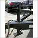 2005 Ford F-250 - Trailer hitch assembly with a black car visible in the background.