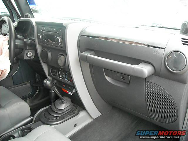 Jeep Wrangler interior with manual transmission and dashboard