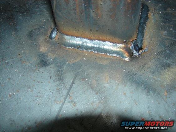 Close-up of a metal joint with visible welding