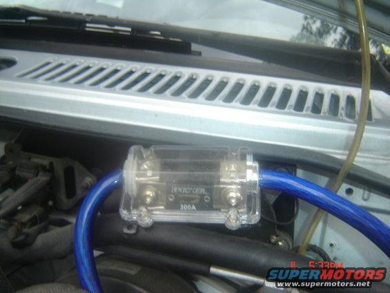 Inline fuse holder with blue wire and 'KICKER 300A' text