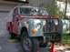 1993 Ford Bronco - This Land Rover Series IIA is parked in front of a garage, supported by red jack stands.