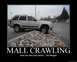 1995 Ford Bronco - This silver SUV is stuck on a rocky incline in a parking lot.