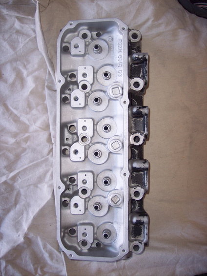 Engine cylinder head with casting numbers F8ZM G049 C8